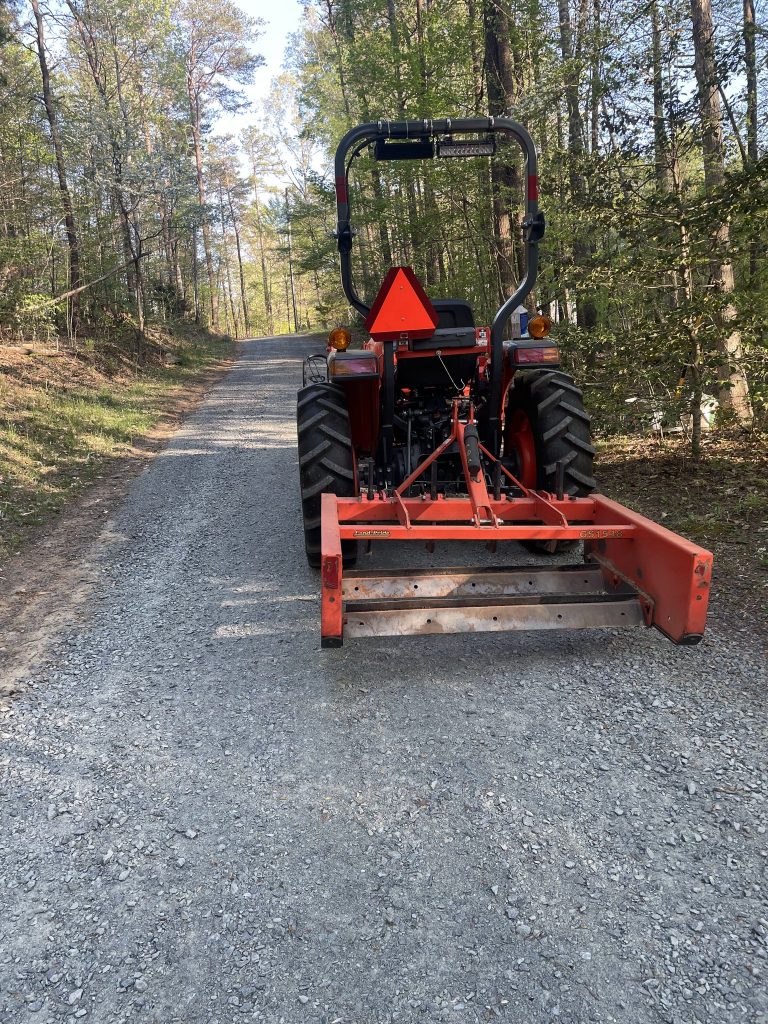 Tractor on freshly graded driveway!!